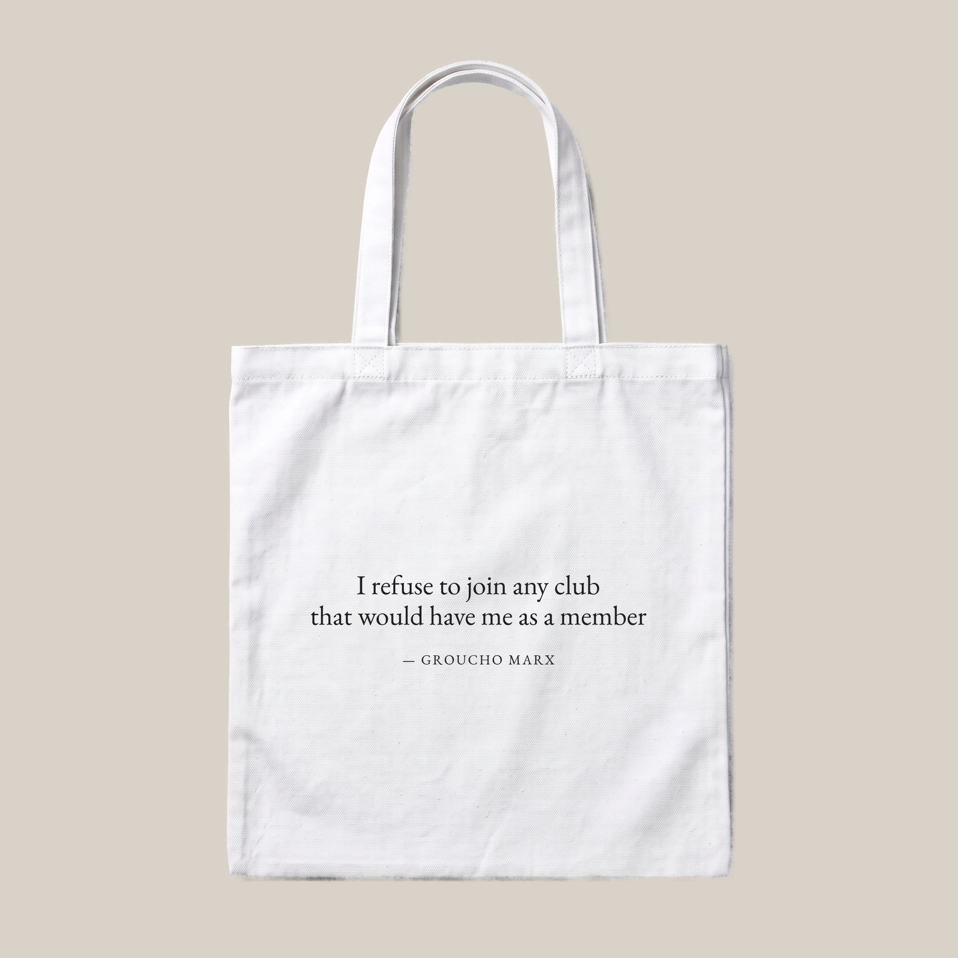 Groucho Marx quote tote bag by Subtext – black text on a white canvas tote with zip closure, front view.