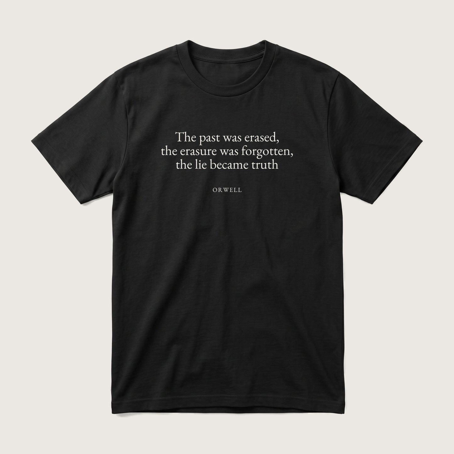 Orwell quote classic t-shirt by Subtext – cream E.B. Garamond text on a black cotton. tee, front view