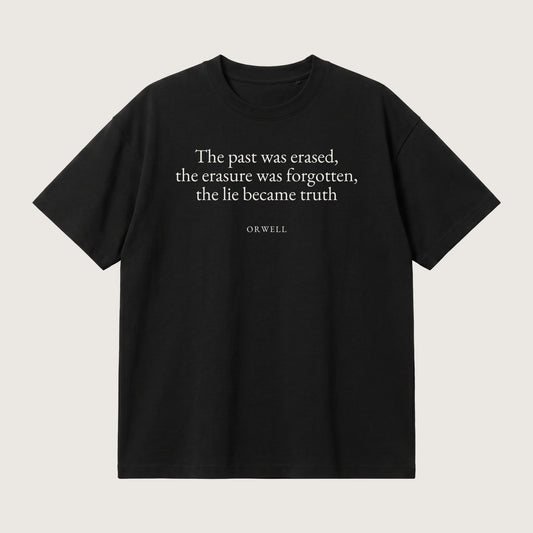 Orwell quote oversized t-shirt by Subtext – cream text on a black oversized cotton tee, front view.