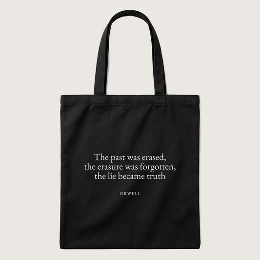 Orwell quote tote bag by Subtext – cream text on a black canvas tote with zip closure, front view.