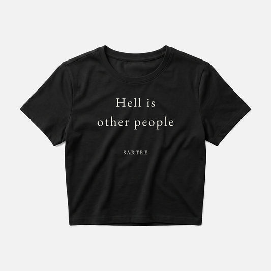 Sartre quote crop top by Subtext – cream text on a black cotton crop top, front view.
