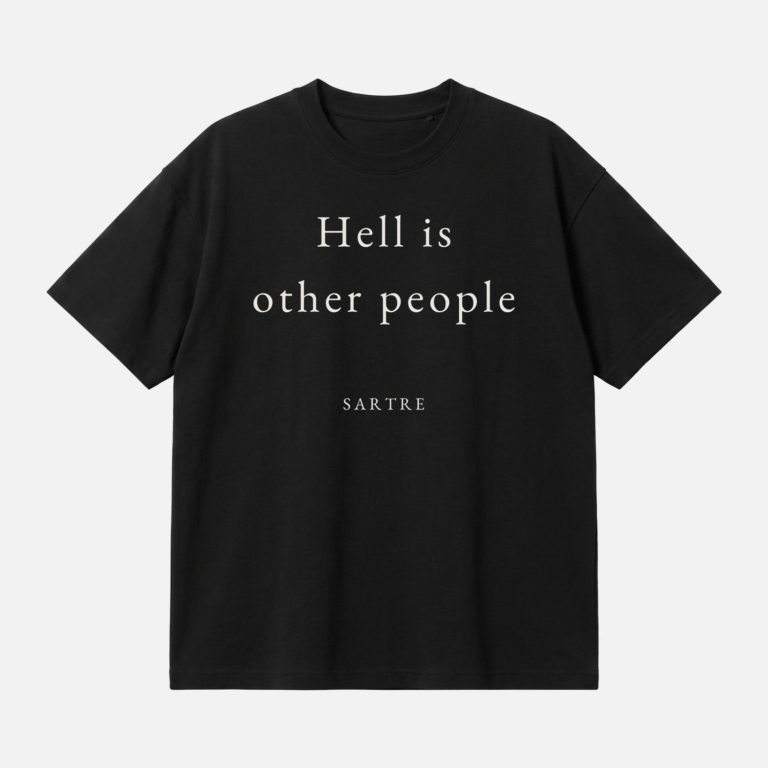 Sartre quote oversized t-shirt by Subtext – cream text on a black oversized cotton tee, front view.