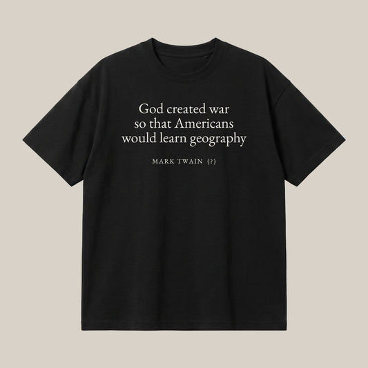 Mark Twain (attributed) quote oversized t-shirt by Subtext – cream text on a black oversized cotton tee, front view.