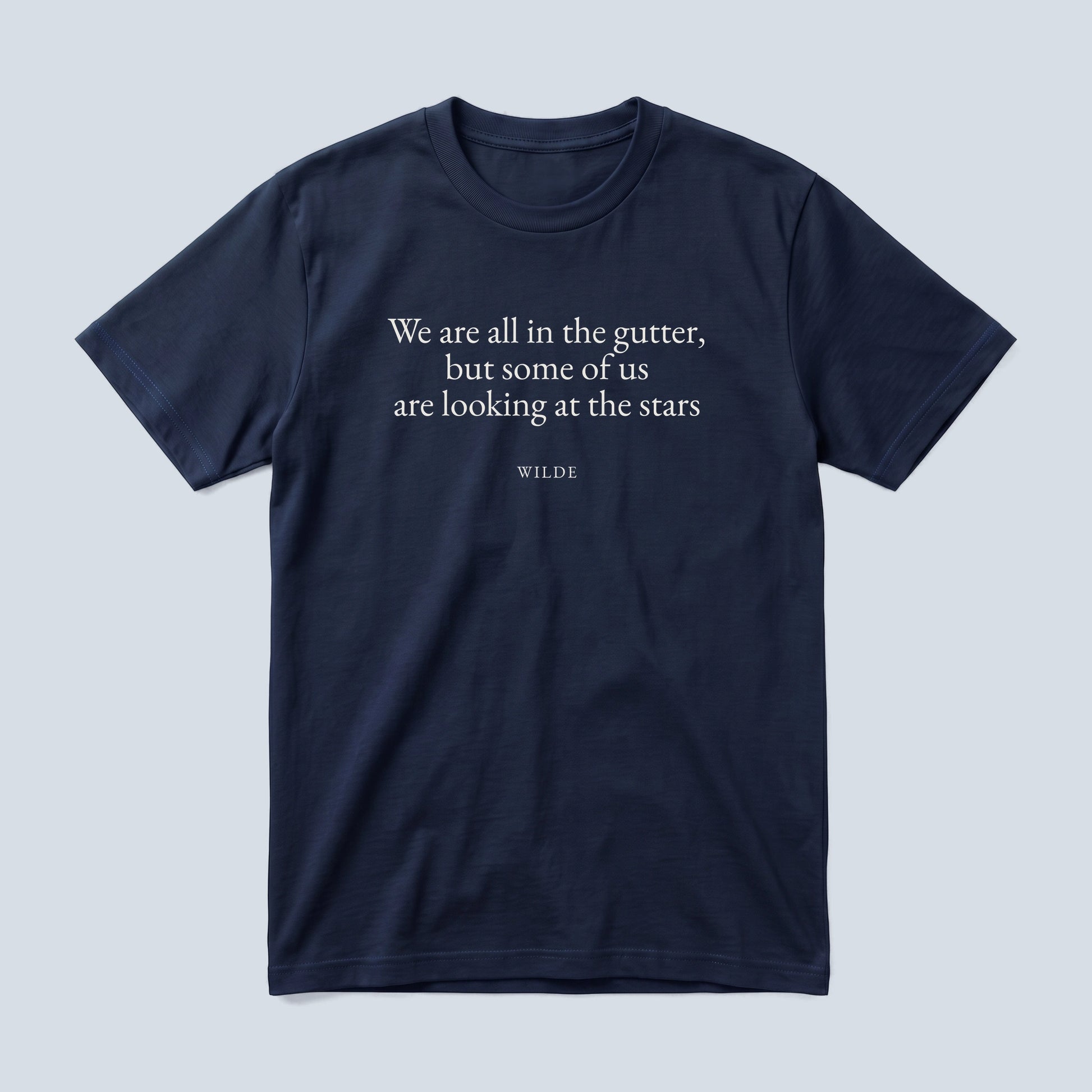 Wilde (Stars) quote classic t-shirt by Subtext – cream E.B. Garamond text on a navy cotton tee, front view.