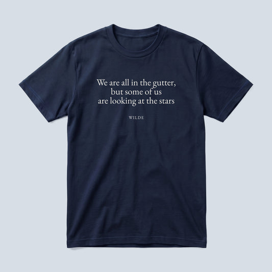 Wilde (Stars) quote classic t-shirt by Subtext – cream E.B. Garamond text on a navy cotton tee, front view.