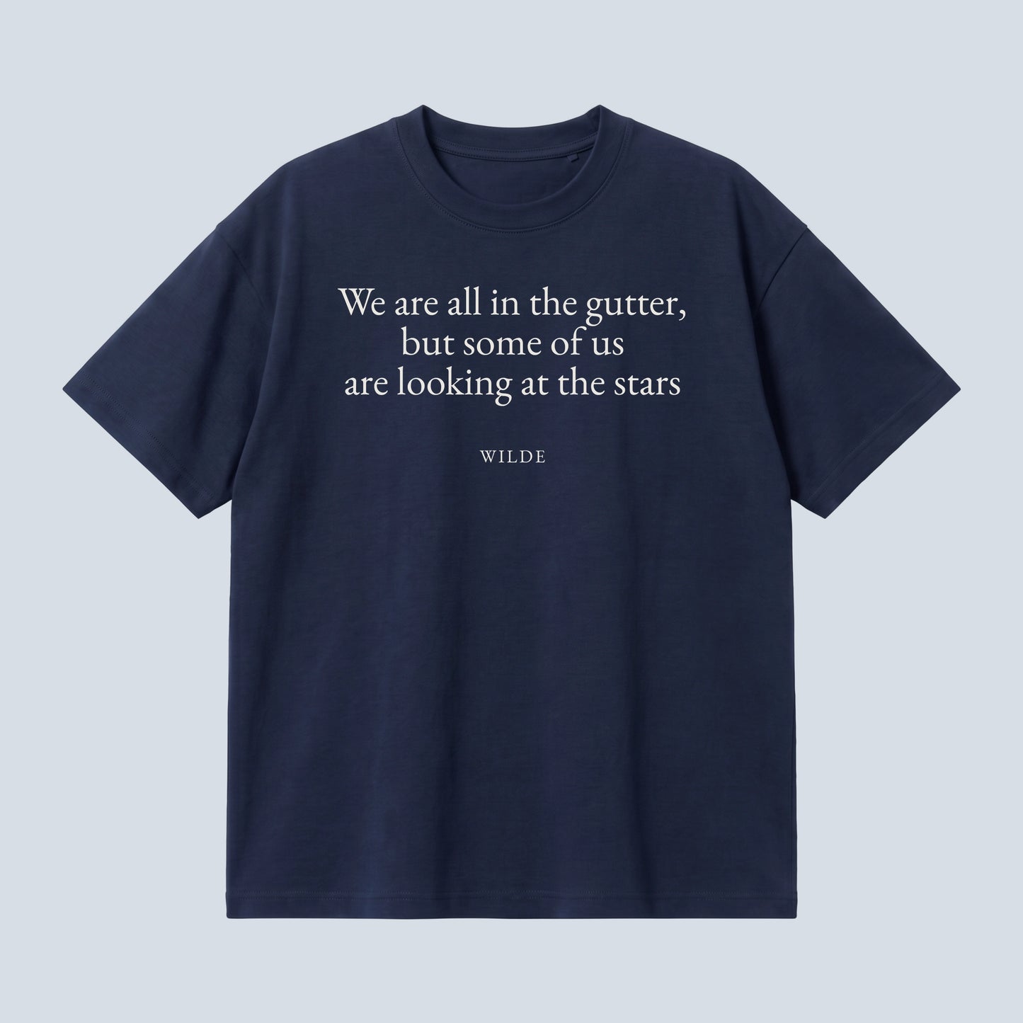 Wilde (Stars) quote oversized t-shirt by Subtext – cream text on a navy oversized cotton tee, front view.