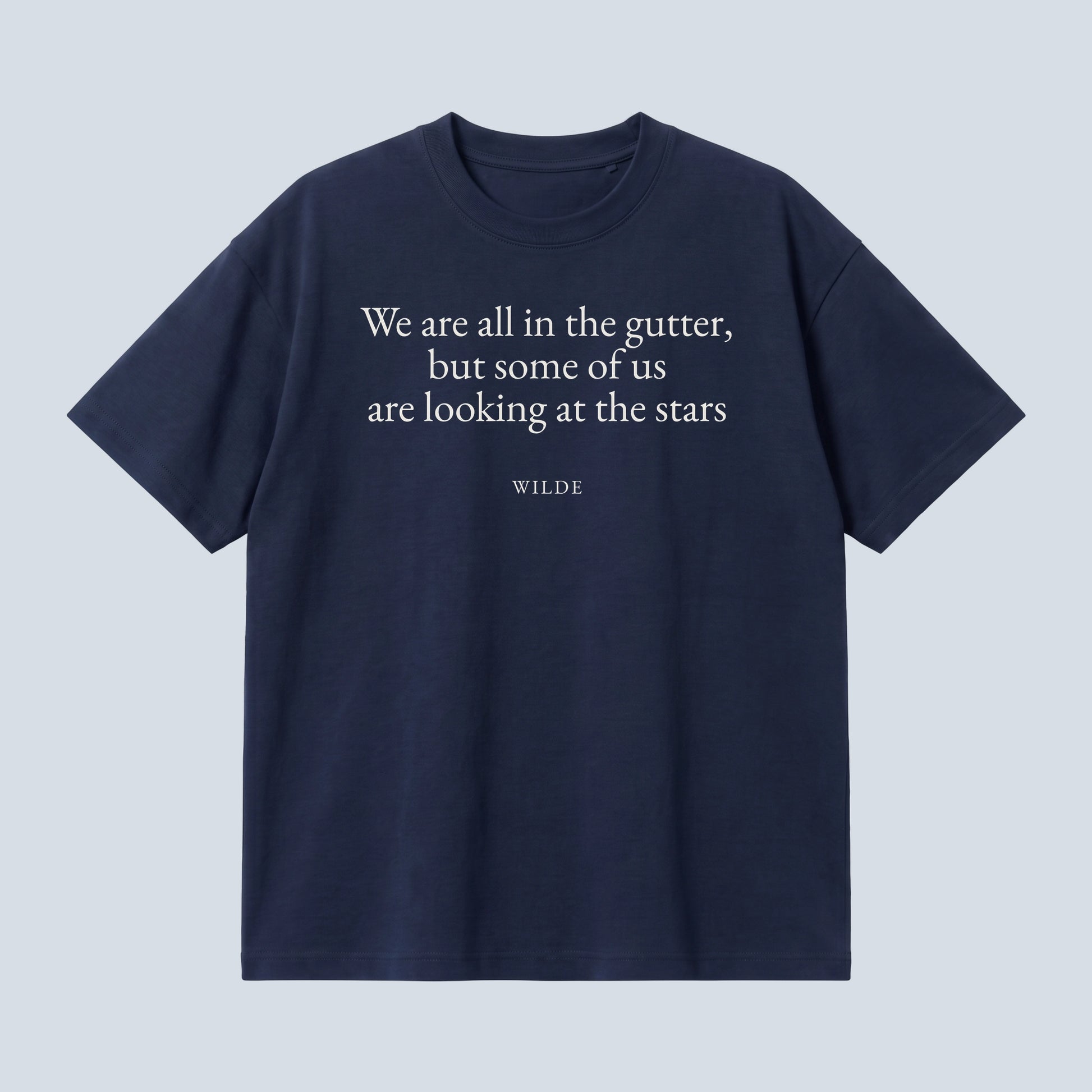 Wilde (Stars) quote oversized t-shirt by Subtext – cream text on a navy oversized cotton tee, front view.