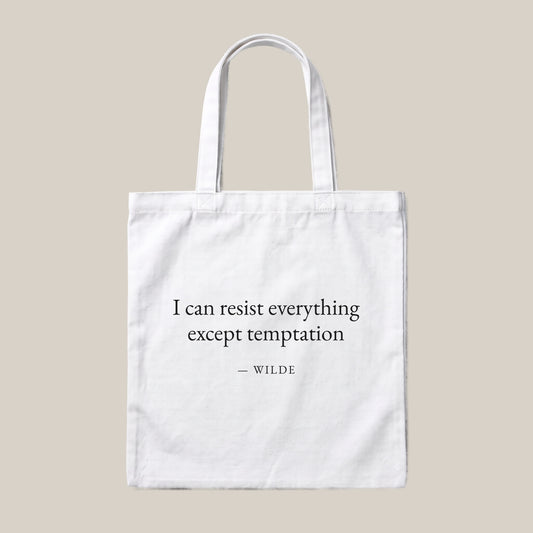 Wilde quote tote bag by Subtext – black text on a white canvas tote with zip closure, front view.